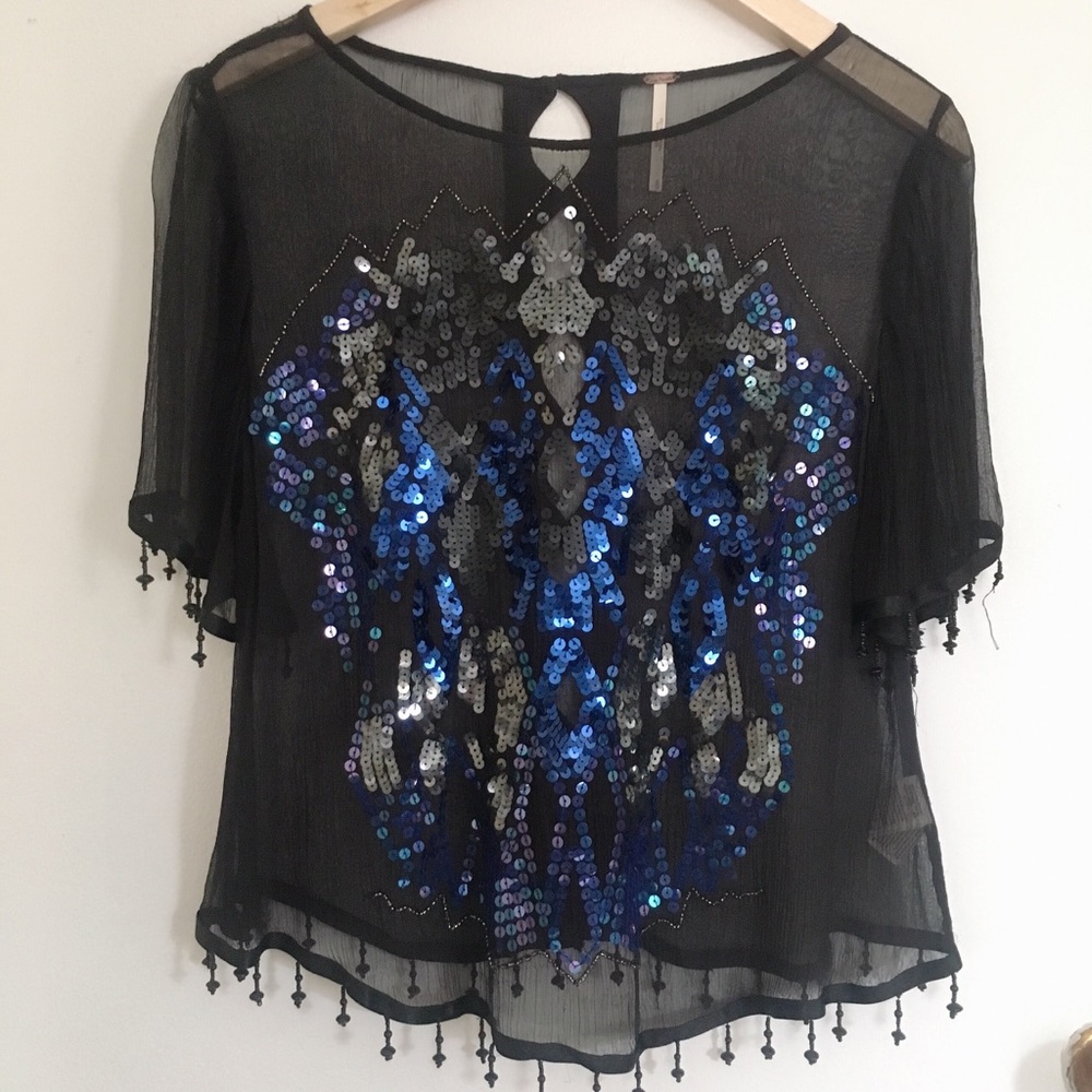 Glitzy sheer blouse